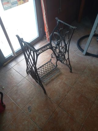 Pie de máquina de coser singer
