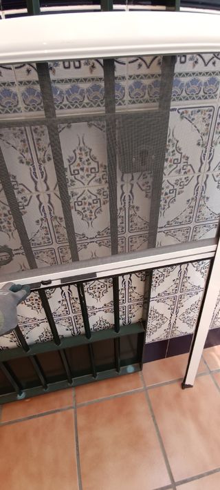 Mosquitera enrollable