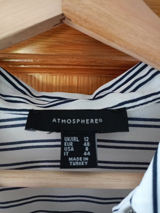 blusa de rayas blanca y negra