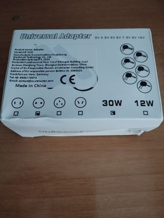 Adaptador universal de corriente 3-12V