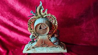 Reloj de bronce con 5 figuras