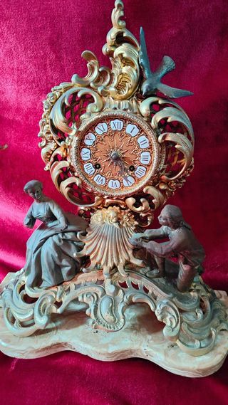 Reloj de bronce con 5 figuras
