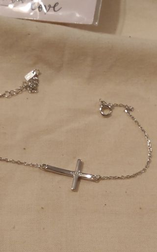Pulsera finita de cruz en plata de primera ley