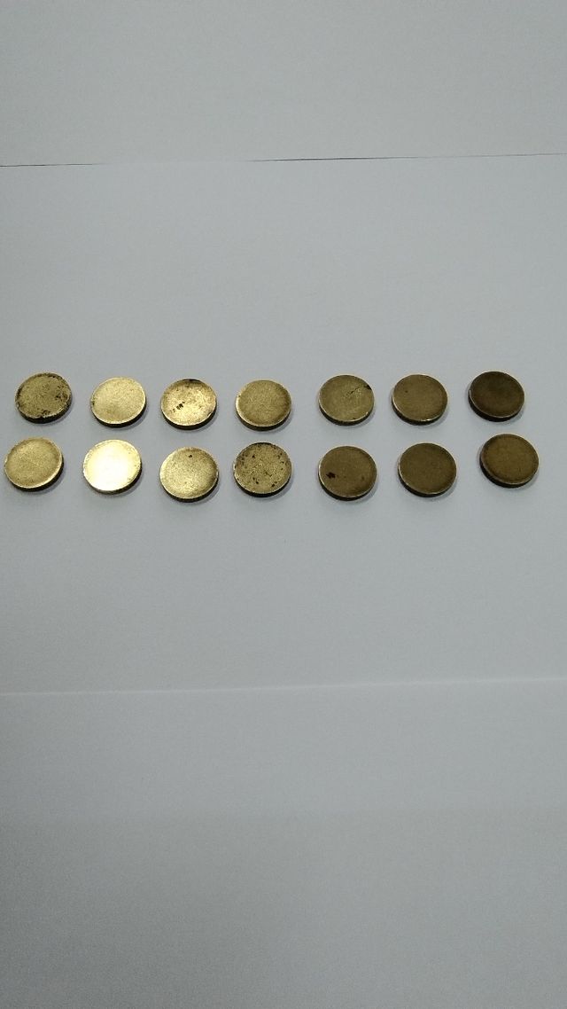 Antiguo cospel para acuñación de monedas