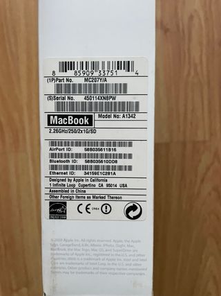 Portatil Apple Macbook blanco estropeado