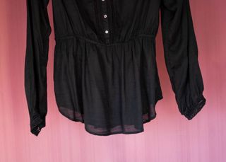 BLUSON NEGRO CON CALADOS