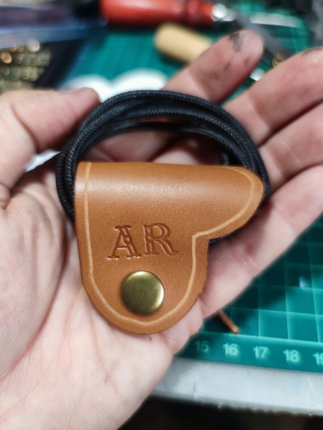 Recoge cable cargador móvil