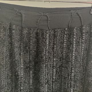 Falda negra, trenzado