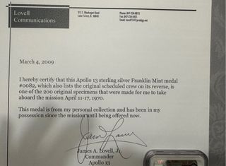 Medalla de plata del astronauta james lovell
