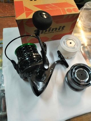 CARRETE DE SURFCASTING -CON TRES BOBINAS- nuevo.