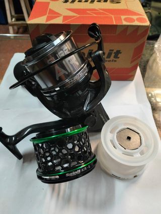 CARRETE DE SURFCASTING -CON TRES BOBINAS- nuevo.
