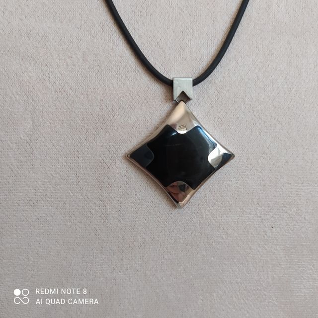 Pendente in acciaio e onice