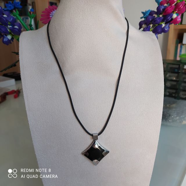 Pendente in acciaio e onice