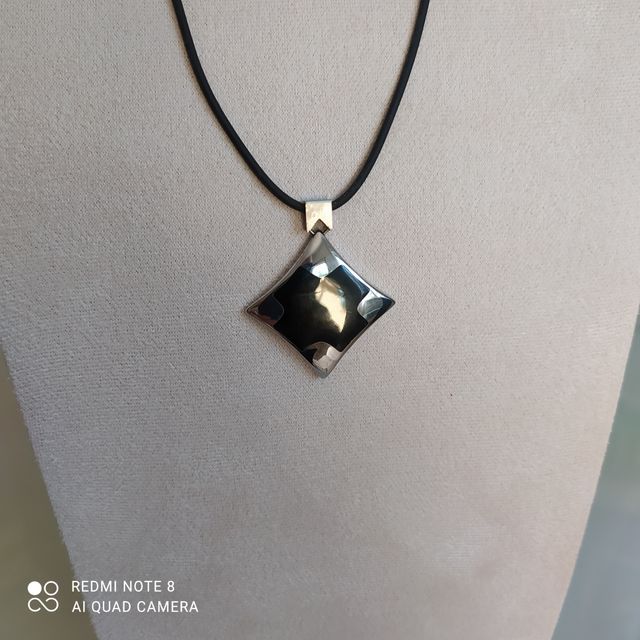 Pendente in acciaio e onice