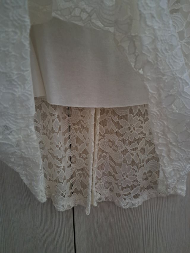 Top bianco elegante in pizzo