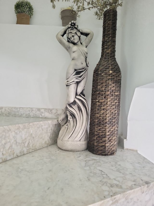 Musa mujer estatua figura