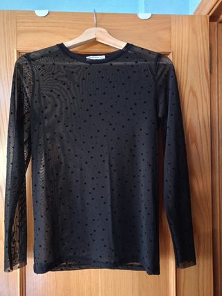 Blusa negra transparente