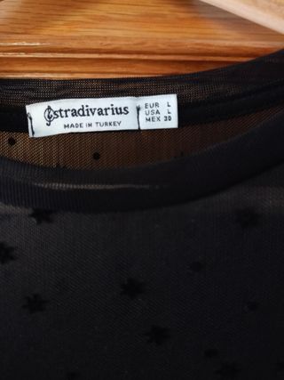 Blusa negra transparente