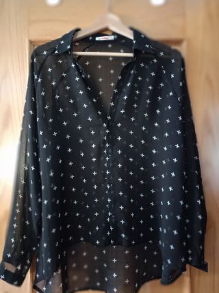 Blusa negra transparente