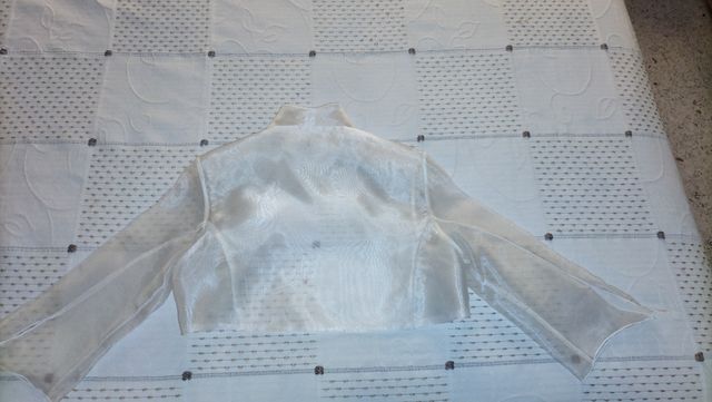 Torera transparente blanca.