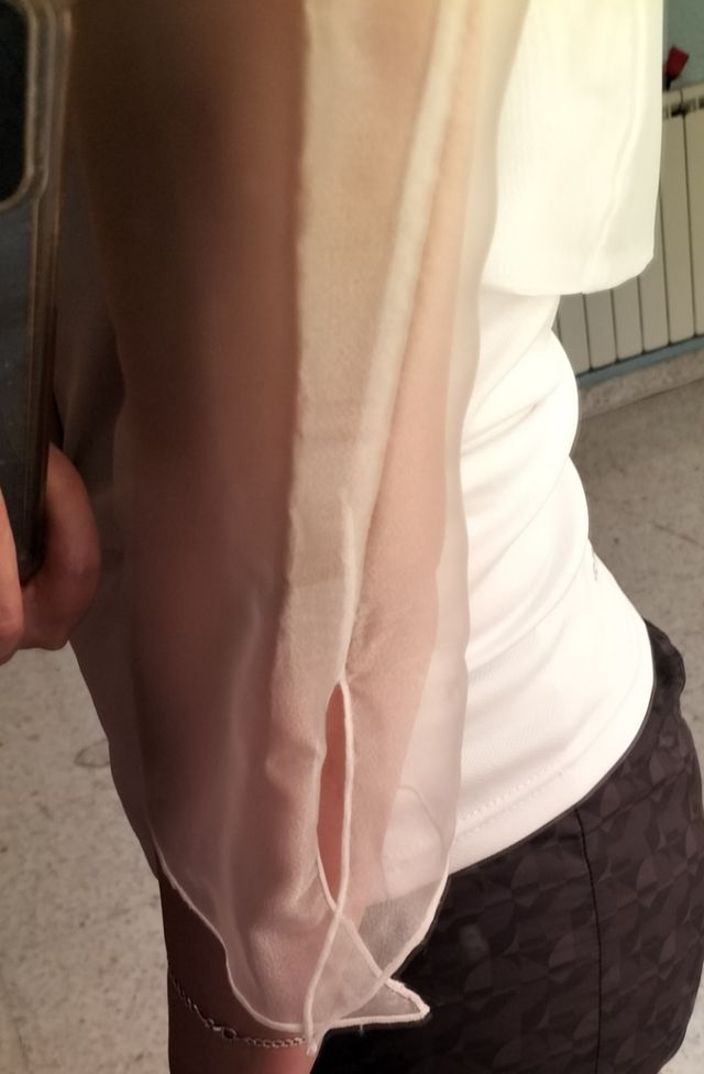 Torera transparente blanca.