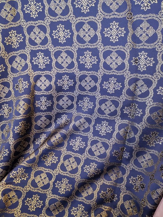 Tela nueva dorada y negra reversible