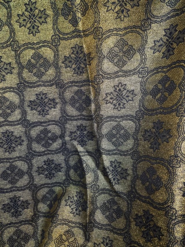 Tela nueva dorada y negra reversible