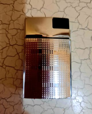 Mechero de plata. 