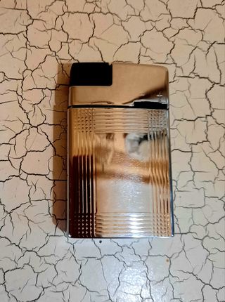Mechero de plata. 