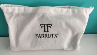 Bolso de mano dorado Farrutx