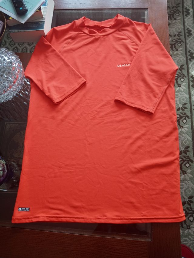 Camiseta deportiva naranja. Talla M