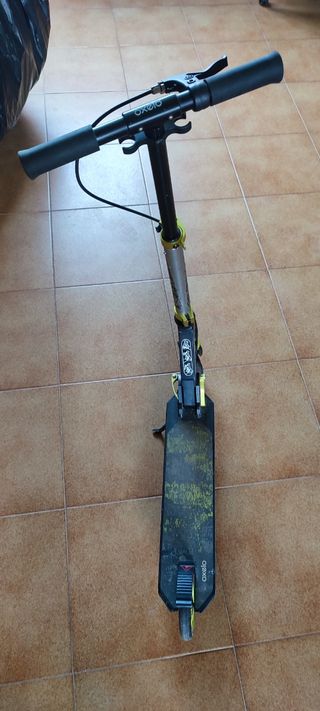 Patinete oxelo negro y oro