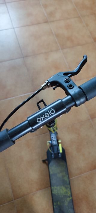 Patinete oxelo negro y oro