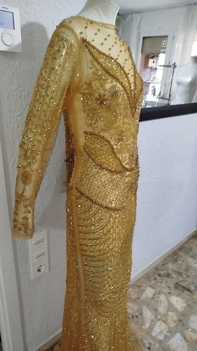Vestidos de pedrería dorados gitanas