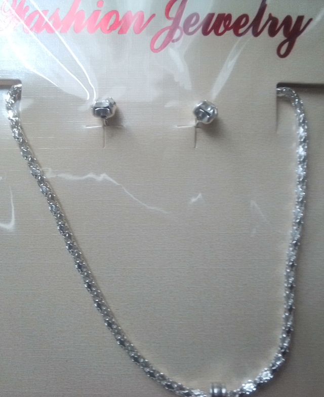 Colgante cruz de cuarzo