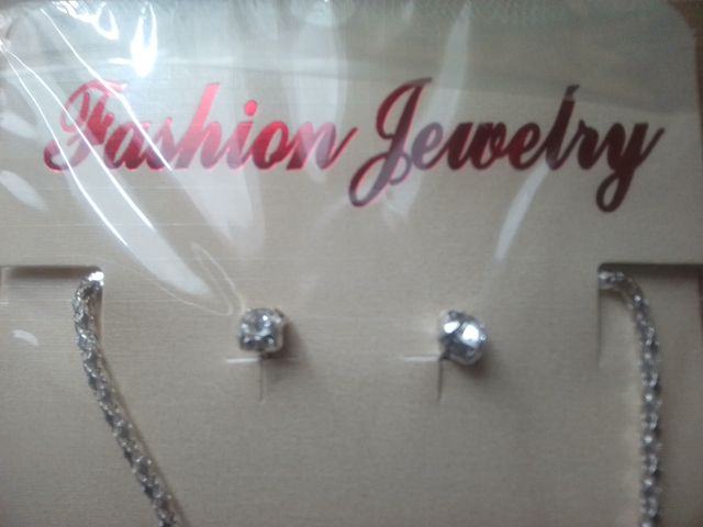 Colgante cruz de cuarzo