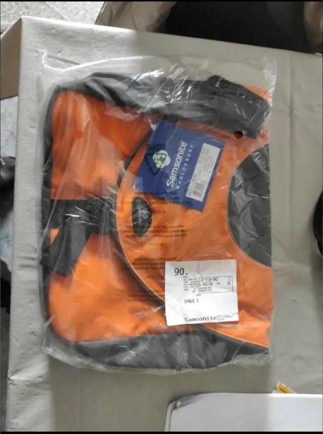 Samsonite bolsa messenger.