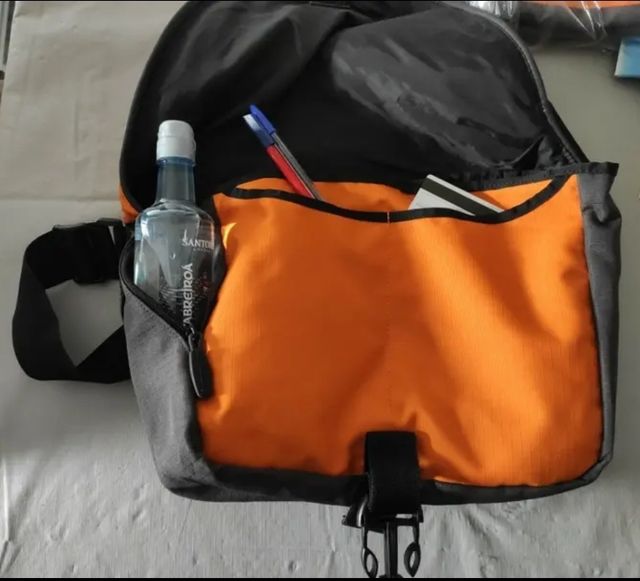 Samsonite bolsa messenger.