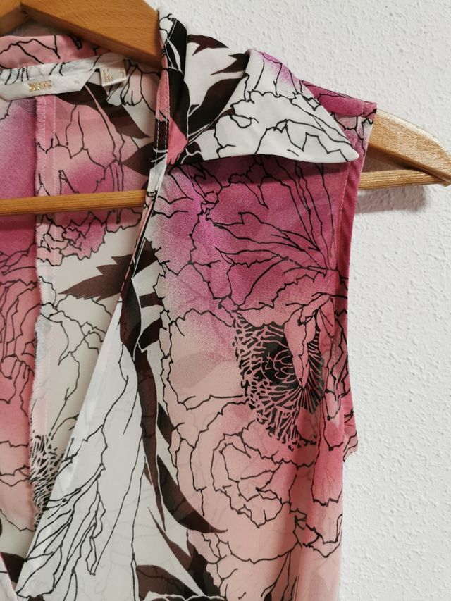 Blusa cruzada de chica talla L de Mango.