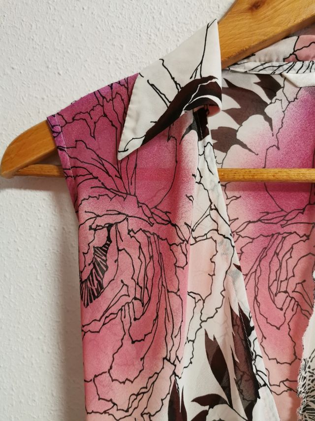 Blusa cruzada de chica talla L de Mango.