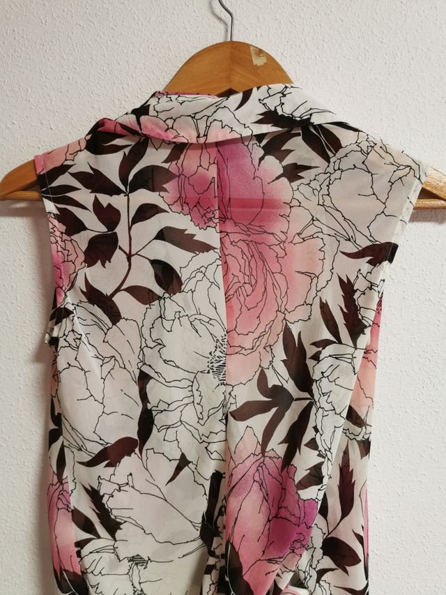 Blusa cruzada de chica talla L de Mango.