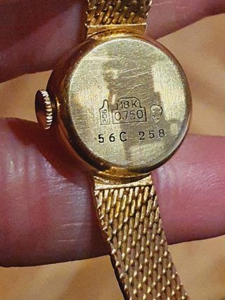 Reloj de oro de 18 kilates .