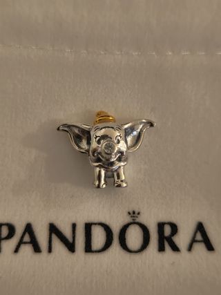 Charm pandora edición limitada 100 aniversario. Du