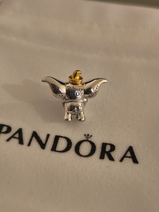 Charm pandora edición limitada 100 aniversario. Du