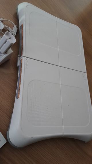 Wii con accesorios y tabla