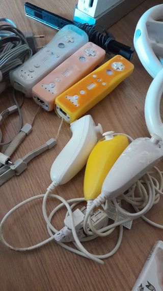 Wii con accesorios y tabla