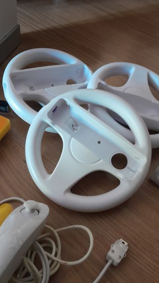 Wii con accesorios y tabla