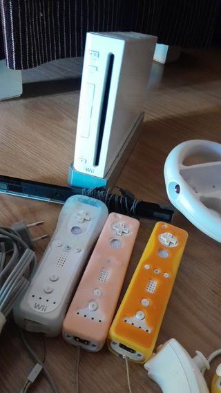 Wii con accesorios y tabla