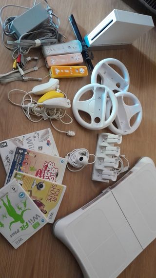 Wii con accesorios y tabla