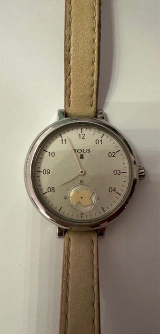 Reloj Tous en acero y tonos rosa clarito.